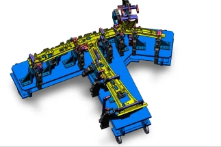 An engineer reviewing a 3D model of a car B-Pillar welding fixture on a computer screen, evaluating the design.