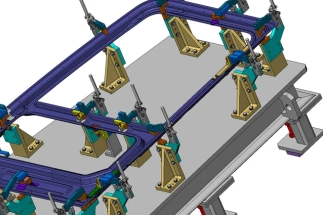 Engineers collaborating on fixture design and 3D modeling. 